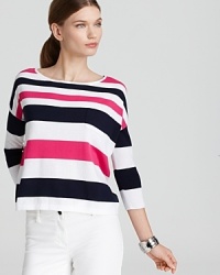Boasting an oversized silhouette and vibrant stripes, this Lilly Pulitzer sweater nods towards retro cool. Boasting an oversized silhouette and vibrant stripes, this Lilly Pulitzer sweater nods towards retro cool.