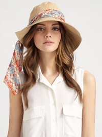 A floppy and fabulous warm-weather ready topper in soft, crisp canvas with a convertible brim and a colorful, removable scarf.CanvasBrim, about 4Imported