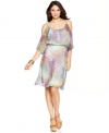 A painterly, abstract print lends an air of sophistication to Cha Cha Vente's alluring shoulder-less dress!