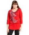 Snag a standout casual look with Style&co.'s three-quarter-sleeve plus size top, showcasing an embellished print.