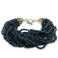 Italian Styled Black Glass Seed 30 Strand Bracelet with Balinese Toggle Clasp Italian Styled Black Glass Seed 30 Strand Bracelet with Balinese Toggle Clasp