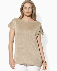 A luxurious foundation of jersey-knit silk lends itself to effortless glamour on the Kenzy boatneck top, finished with glistening metallic threads and chic lace-up detailing at the left sleeve. A luxurious foundation of jersey-knit silk lends itself to effortless glamour on the Kenzy boatneck top, finished with glistening metallic threads and chic lace-up detailing at the left sleeve.