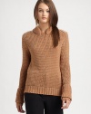 A wool-rich style in a chunky textural knit with romantic layered cuffs.Ribbed collarLong sleevesLayered ribbed cuffs60% wool/39% acrylic/1% cashmereDry cleanImportedModel is 5'10 (177cm) wearing US size Small. 