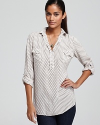Known for their signature shirts, this Splendid henley stays true to form with classic styling and a fresh geo dot print. Known for their signature shirts, this Splendid henley stays true to form with classic styling and a fresh geo dot print.