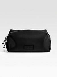 The ultimate travel essential, crafted in Italy from smooth leather. Zip closure Leather logo plaque detail 11W X 4¾H X 4¾D Made in Italy The ultimate travel essential, crafted in Italy from smooth leather. Zip closure Leather logo plaque detail 11W X 4¾H X 4¾D Made in Italy