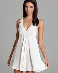 In lightly textured chiffon, Oscar de la Renta Pink Label's Romantic Whispers chemise features soft, feminine style. In lightly textured chiffon, Oscar de la Renta Pink Label's Romantic Whispers chemise features soft, feminine style.