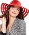 The sheerest stripes make for a delicate, feminine look. This stylish floppy hat from Nine West is a ladylike creation crafted from packable straw, for simple storage.