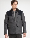 Made from fine Italian fabrication, this jacket offers a unique take on on-trend mixed media.Corduroy collarZipper frontOversized patch pocketsQuilted details on front and backAbout 30 from shoulder to hem70% wool/20% nylon/10% cashmere; cotton liningDry cleanImported of Italian fabric