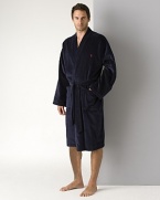 Polo Ralph Lauren kimono-inspired robe in ultra-soft cotton velour. Self-tie belt. Shawl collar, patch pockets. Signature embroidered polo player detail at chest.