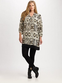 Designed to catch the eye, a silk design with an exotic tribal print.Self-tie detail at necklineLong sleevesAllover printSolid hemBack yokeAbout 37 from shoulder to hemSilkDry cleanImported Designed to catch the eye, a silk design with an exotic tribal print.Self-tie detail at necklineLong sleevesAllover printSolid hemBack yokeAbout 37 from shoulder to hemSilkDry cleanImported