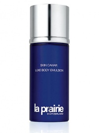 Skin Caviar Luxe Body Emulsion. A luxuriously rich body lotion formulated with caviar extract that drenches the body in an extravagant gift of moisture replacing weak, dull and dry skin with firmed, toned and illuminated skin. Contains La Prairie's exclusive cellular complex that helps stimulate the skin's natural repair process, moisturizing and energizing with nutrients that encourage optimal functioning. Discourages cellulite formation. 6.8 oz. Skin Caviar Luxe Body Emulsion. A luxuriously rich body lotion formulated with caviar extract that drenches the body in an extravagant gift of moisture replacing weak, dull and dry skin with firmed, toned and illuminated skin. Contains La Prairie's exclusive cellular complex that helps stimulate the skin's natural repair process, moisturizing and energizing with nutrients that encourage optimal functioning. Discourages cellulite formation. 6.8 oz.