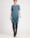 This soft cashmere/silk blend style is finished with an artfully draped twist at the hemline.CrewneckShort sleevesTwisted hemline drapeAbout 24 from shoulder to hem70% cashmere/30% silkDry cleanMade in Italy of imported fabricModel shown is 5'10 (177cm) wearing US size 4. 