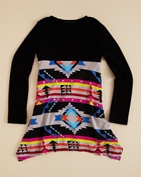Tribal print is all over this season's hottest looks. Flowers by Zoe contrasts a colorful print with a solid colorblock to drum rhythm and movement to this flowing arc-hem tunic. Tribal print is all over this season's hottest looks. Flowers by Zoe contrasts a colorful print with a solid colorblock to drum rhythm and movement to this flowing arc-hem tunic.
