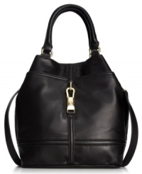 Make a definitive daytime statement with this decidedly elegant design from Calvin Klein. Sumptuous leather and luxe hardware adorn the outside, while the generous interior effortlessly stows your everyday essentials. Make a definitive daytime statement with this decidedly elegant design from Calvin Klein. Sumptuous leather and luxe hardware adorn the outside, while the generous interior effortlessly stows your everyday essentials.