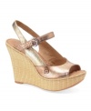 Born adds comfort and contemporary flair to the season's hottest shoe: the wedge. The Mina design features either metallic or patent leather atop an earthy raffia-wrapped wedge heel.