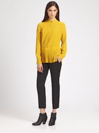 Mandarin collar, pleated apron panel and buttoned cuffs transform this silk-blend basic. Mandarin collarButton frontLong sleeves with buttoned cuffsPleated front hemSlight opening at back neckLonger length hits below the hips65% acetate/35% silkDry cleanImported of Italian fabricModel shown is 5'10 (177cm) wearing US size 2. Mandarin collar, pleated apron panel and buttoned cuffs transform this silk-blend basic. Mandarin collarButton frontLong sleeves with buttoned cuffsPleated front hemSlight opening at back neckLonger length hits below the hips65% acetate/35% silkDry cleanImported of Italian fabricModel shown is 5'10 (177cm) wearing US size 2.