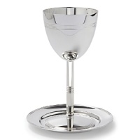 A new heritage piece for your family, this classic and elegant Kiddush cup & saucer set is crafted from Christofle silver. A new heritage piece for your family, this classic and elegant Kiddush cup & saucer set is crafted from Christofle silver.