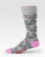 Elegant, finely woven dress socks with a paisley pattern and bright color at the toe and heel. Mid-calf height 80% cotton/19% nylon/1% Lycra Machine wash Imported 
