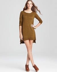 Enjoy a luxurious silhouette as sumptuous merino wool inspires an effortless Eileen Fisher sweater dress. The high/low hem lends itself to knit tights and chunky booties for rugged sophistication. Enjoy a luxurious silhouette as sumptuous merino wool inspires an effortless Eileen Fisher sweater dress. The high/low hem lends itself to knit tights and chunky booties for rugged sophistication.