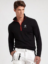 RLX's modern mockneck is workout-ready in breathable, moisture-wicking polyester with reflective logos for added safety.Half-zip frontStand collarZippered pocket at sleevePolyesterMachine washImported RLX's modern mockneck is workout-ready in breathable, moisture-wicking polyester with reflective logos for added safety.Half-zip frontStand collarZippered pocket at sleevePolyesterMachine washImported