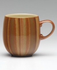 Add a whimsical accent to Denby's Fire dinnerware and dishes collection with the Chilli large mug. The mod circle design is rendered in the same warm earth tones of green and terra cotta as the solid pieces to create a contrasting yet coordinated look. Not shown. Add a whimsical accent to Denby's Fire dinnerware and dishes collection with the Chilli large mug. The mod circle design is rendered in the same warm earth tones of green and terra cotta as the solid pieces to create a contrasting yet coordinated look. Not shown.