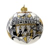 Depicting shoppers in front of the glamorous Art Deco façade of Bloomingdale's flagship store, this 2012 limited edition ornament by Michael Storrings is delightfully hand painted in jazzy geometric black and white shapes with accents of silver and gold metallics and glitter.