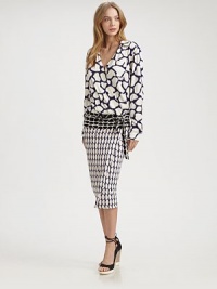 Blocks of eye-popping print come together in this shapely blouson wrap crafted from sumptuous silk jersey.Point collarCrossover V necklineLong sleevesButton cuffsChest pocketBlouson bodiceWrap-around self-beltAbout 27 from natural waistSilkDry cleanImportedModel shown is 5'9 (175cm) wearing US size 4. Blocks of eye-popping print come together in this shapely blouson wrap crafted from sumptuous silk jersey.Point collarCrossover V necklineLong sleevesButton cuffsChest pocketBlouson bodiceWrap-around self-beltAbout 27 from natural waistSilkDry cleanImportedModel shown is 5'9 (175cm) wearing US size 4.