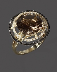 Black and white diamonds frame a faceted smoky quartz, set in 14K yellow gold. Black and white diamonds frame a faceted smoky quartz, set in 14K yellow gold.