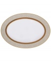 Noritake makes any occasion memorable with the opulent Odessa Gold oval platter. Wide bands of etched gold and pale gray with delicate blooms adorn classic bone china.