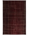 A saturated hue plays host to a contemporary, linear pattern, creating a striking statement in any space. Thick and resilient underfoot, this plush piece is woven from 2-ply nylon pile, ensuring easy care and long-lasting wear.