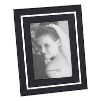 This modern design draws the eye with a silver bezel accent, then steps aside so you can admire your favorite photo without distraction. Featuring a black leather cover for a luxurious touch. This modern design draws the eye with a silver bezel accent, then steps aside so you can admire your favorite photo without distraction. Featuring a black leather cover for a luxurious touch.