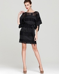 Sultry lace stripes lend allure to this modern Laundry by Shelli Segal dress--bold red lips make the perfect accessory. Sultry lace stripes lend allure to this modern Laundry by Shelli Segal dress--bold red lips make the perfect accessory.