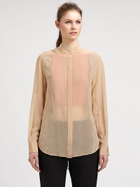 Tantalizingly sheer silk chiffon is luxuriously detailed with lace insets at the sides and sleeves, plus an inside floating front bib that adds graceful discretion.Satin band collarLong sleeves with satin button cuffsHidden button placketShirttail hemAbout 30 from shoulder to hemSilkDry cleanImported of Italian fabricSIZE & FITModel shown is 5'10 (177cm) wearing US size 4. This style runs large. Tantalizingly sheer silk chiffon is luxuriously detailed with lace insets at the sides and sleeves, plus an inside floating front bib that adds graceful discretion.Satin band collarLong sleeves with satin button cuffsHidden button placketShirttail hemAbout 30 from shoulder to hemSilkDry cleanImported of Italian fabricSIZE & FITModel shown is 5'10 (177cm) wearing US size 4. This style runs large.