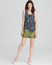 Emboldened by a graphic print, this easy-chic Julie Dillon dress will effortlessly take you from office hours to off hours in trend-perfect style. Emboldened by a graphic print, this easy-chic Julie Dillon dress will effortlessly take you from office hours to off hours in trend-perfect style.