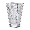 Designed by Nicolas Triboulot for Baccarat, this sparkling crystal vase features extraordinary craftsmanship-horizontal bevel cuts on the outside and vertical bevel cuts on the inside-for a dazzling refractive effect.