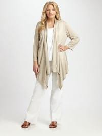 A feminine, open-front cardigan made from soft jersey and featuring a pretty, cascade front.Shawl collarThree-quarter sleevesCascade frontAbout 33 from shoulder to hemViscoseHand washImported of Italian fabric A feminine, open-front cardigan made from soft jersey and featuring a pretty, cascade front.Shawl collarThree-quarter sleevesCascade frontAbout 33 from shoulder to hemViscoseHand washImported of Italian fabric