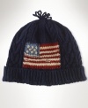 Constructed for a snug fit, a warm hat is rendered in a soft cotton blend with a knit flag at the front for a star-spangled finish.
