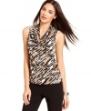 A softly draped cowl neckline and chic graphic print make a slinky sleeveless top from Alfani the perfect choice for any occasion. Add subtle accessories for work or dress it up for a night on the town.