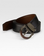 A modern classic crafted in reversible calfskin leather with an adjustable gancino buckle. Reverses from black to brown Leather Ruthenium buckle About 1 wide Made in Italy 