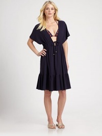 A coverup that doesn't compromise comfort to be stylish. Its self-tie waist complements the figure flawlessly. Short sleevesSelf-tie92% rayon/8% spandexDry cleanImported A coverup that doesn't compromise comfort to be stylish. Its self-tie waist complements the figure flawlessly. Short sleevesSelf-tie92% rayon/8% spandexDry cleanImported