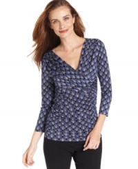 Ellen Tracy's V-neck top is always in style. The fan print adds interest when you pair it with solid separates.