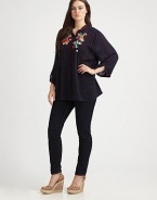 Pretty floral embroidery perfectly complements this feminine design. There is no doubt that this relaxed-fit top would be a welcomed addition to your wardrobe.Split neckLong sleevesEmbroidered detailsAbout 32 from shoulder to hemRayonMachine washImported