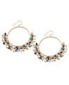 Calling all free spirits...Lauren by Ralph Lauren's boho-chic earrings feature a gypsy hoop setting decorated by dozens of multicolored wood and glass beads. Set in brass tone mixed metal. Approximate drop: 2-1/2 inches.