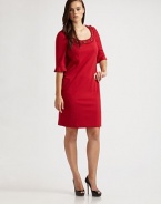 A bold design with a pretty jeweled neckline and ruffle detailed sleeves. Jeweled embellished scoop neck Elbow sleeves with ruffle cuffs Concealed back zip closure Princess seams Back vent Fully lined About 24 from natural waist 65% viscose/32% nylon/3% spandex Dry clean Made in Italy 