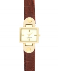 Crisp sophistication with feminine flair, by Nine West. Crafted of textured brown leather strap and square gold tone mixed metal case. Champagne dial features gold tone and black applied stick indices, gold tone hour and minute hands, sweeping second hand and logo at six o'clock. Quartz movement. Limited lifetime warranty. Crisp sophistication with feminine flair, by Nine West. Crafted of textured brown leather strap and square gold tone mixed metal case. Champagne dial features gold tone and black applied stick indices, gold tone hour and minute hands, sweeping second hand and logo at six o'clock. Quartz movement. Limited lifetime warranty.