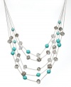 Illusively chic. INC International Concepts' intriguing illusion necklace features five delicate rows of black glass rondelles, plastic turquoise beads, and glass fireballs. Set in 12k gold-plated mixed metal. Approximate length: 18-1/2 inches + 3-inch extender. Approximate drop: 3-1/2 inches.