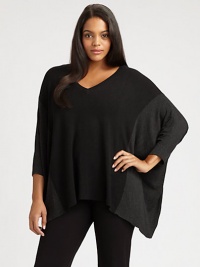 Colorblocking meets a relaxed-yet-flattering fit to create a idyllic silhouette that looks great with sleek pants.V-neckDolman sleevesPull-on styleHi-lo hemRibbed trimAbout 25 from shoulder to hemViscose/nylon/spandexDry cleanImported of Italian fabric Colorblocking meets a relaxed-yet-flattering fit to create a idyllic silhouette that looks great with sleek pants.V-neckDolman sleevesPull-on styleHi-lo hemRibbed trimAbout 25 from shoulder to hemViscose/nylon/spandexDry cleanImported of Italian fabric