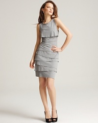 Make a fierce statement in this arresting tiered jersey tank dress from Laundry by Shelli Segal. Make a fierce statement in this arresting tiered jersey tank dress from Laundry by Shelli Segal.