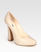 A towering sculpted heel upgrades this classic silhouette of Italian leather. Self-covered heel, 4½ (115mm)Covered platform, ½ (15mm)Compares to a 4 heel (100mm)Leather upperLeather lining and solePadded insoleMade in ItalyOUR FIT MODEL RECOMMENDS ordering one half size up as this style runs small. 