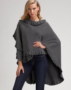 Beautifully draped merino/angora knit with elegant ruffle trim. About 42 X 54 Merino/angora; dry clean Made in Scotland